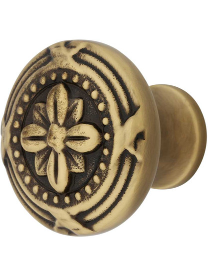 1 3/4 inch Ribbon and Reed Cabinet Knob in Antique Brass.